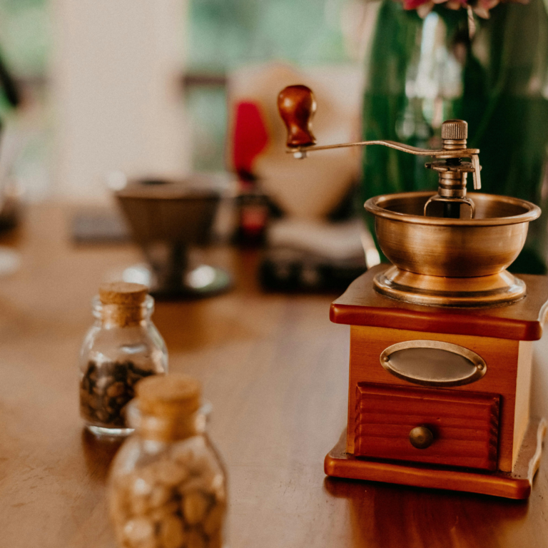 Manual coffee grinder on a table